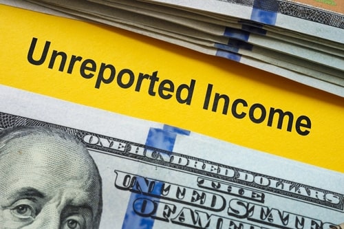 cash on yellow paper with unreported income